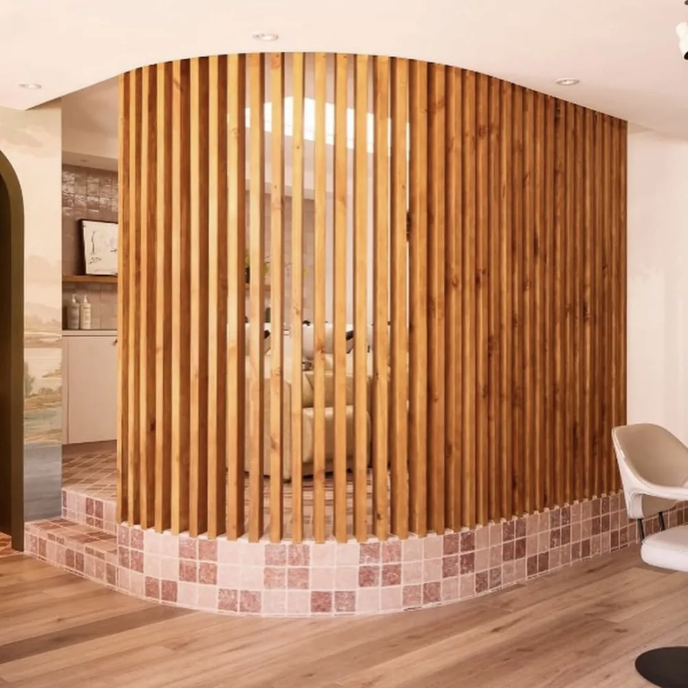 Curved timber slat wall on a tiled base